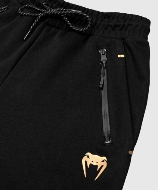 Moške jogger hlače dolge črne z logo na hlačnici