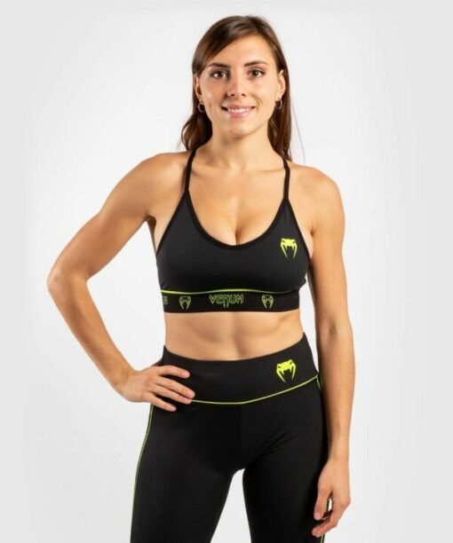 Women's sports bra Venum black with a yellow logo on the front